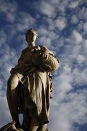 Famous Italian statue at the background of cloudy sky