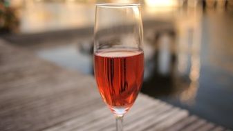 rose wine in a glass on the terrace