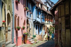 multi-colored facades of buildings in a village in Alsace, France