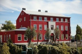 red historical building of Hotel at summer, Germany, Frankfurt-oder