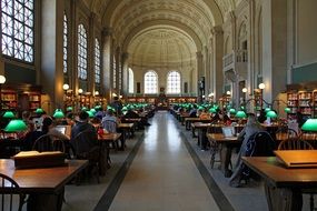 visitors in the reading room of the Boston Public Library