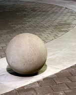 ball as a stone statue