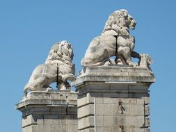 lions on a bridge in arles