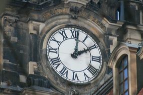 clock showing the time on the building