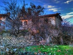 ruins of an old house among the picturesque landscape