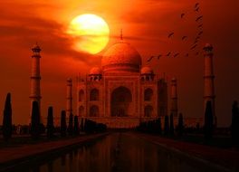 bright sun at sunset over the Taj Mahal