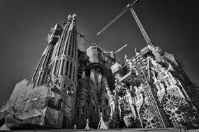 The Basilica de la Sagrada Familia is a large unfinished Roman Catholic minor basilica in Barcelona, Spain