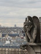 gothic gargoyle statue in Paris, France