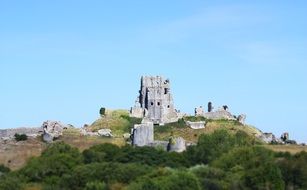 ruins of an ancient castle on a hill