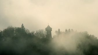landscape of the tower in the autumn fog