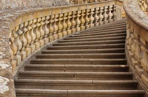 aged stone stairway with balustrade