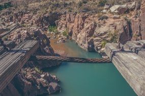 wooden bridge over the canyon