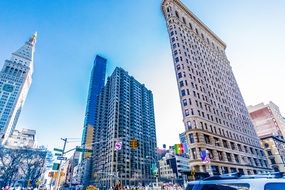 Flatiron building in New York cityscape on a sunny day