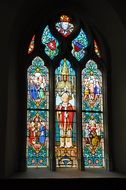 stained glass windows of a catholic gothic church