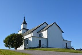 Small church at the blue sky background