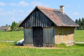 small wooden farm house