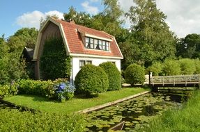 house among a picturesque garden in the netherlands