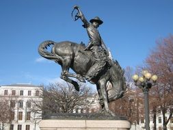 Cowboy Statue in a park in Denver