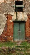 green door of an old building