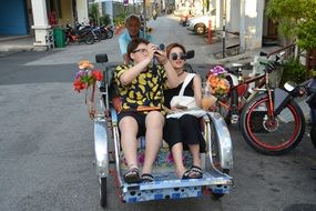 tourists ride a wagon