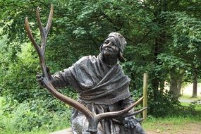 bronze statue of a woman in sababurg castle