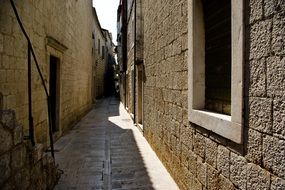 narrow old street in Trogir, Croatia