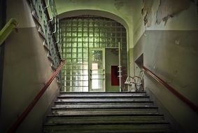 staircase of a ramshackle school