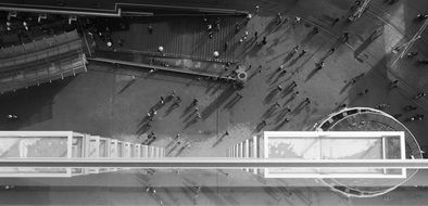 black and white photo of people in a megalopolis aerial view