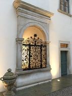 beautiful wrought iron decoration on arched window