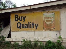 banner with inscriptions on the wall of the barn