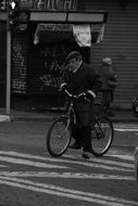 Black and white photo of the bicyclist in Milan