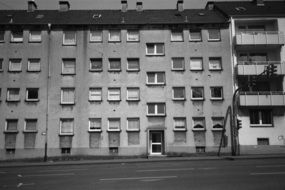 four-storey tenement house at road