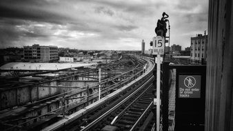 black and white photo of the railway in new york