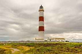 striped Lighthouse at Cloudy sky