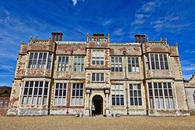 stately home under blue sky