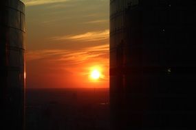 bright sunset through the glass facade of a building in Moscow