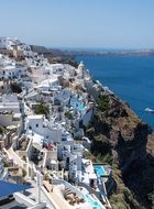 white houses in santorini on the hill