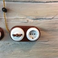 rustic switch and socket on the wall