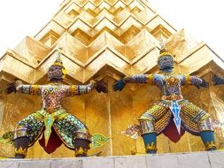 buddha statues on tower in thailand