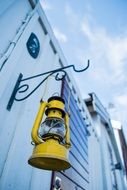 vitage yellow replacement lamp on wall, Sweden, Karlskrona