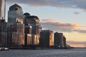 Skyline of city waterfront at evening, usa, nyc