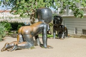 bronze sculpture of a crawling child in Prague
