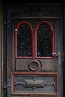 wooden front door with glass windows
