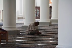 Praying Muslim man in Mosque
