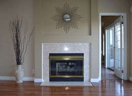Fireplace in room beside of the door entrance, Home Decor