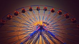 liberty, colorful ferris wheel at evening sky