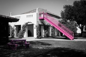 pink staircase near the house