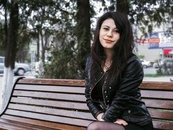 portrait of a girl on a bench