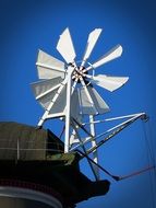 White pinwheel on a roof