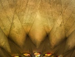 Sagrada famÃ­lia cathedral ceiling with colorful lights